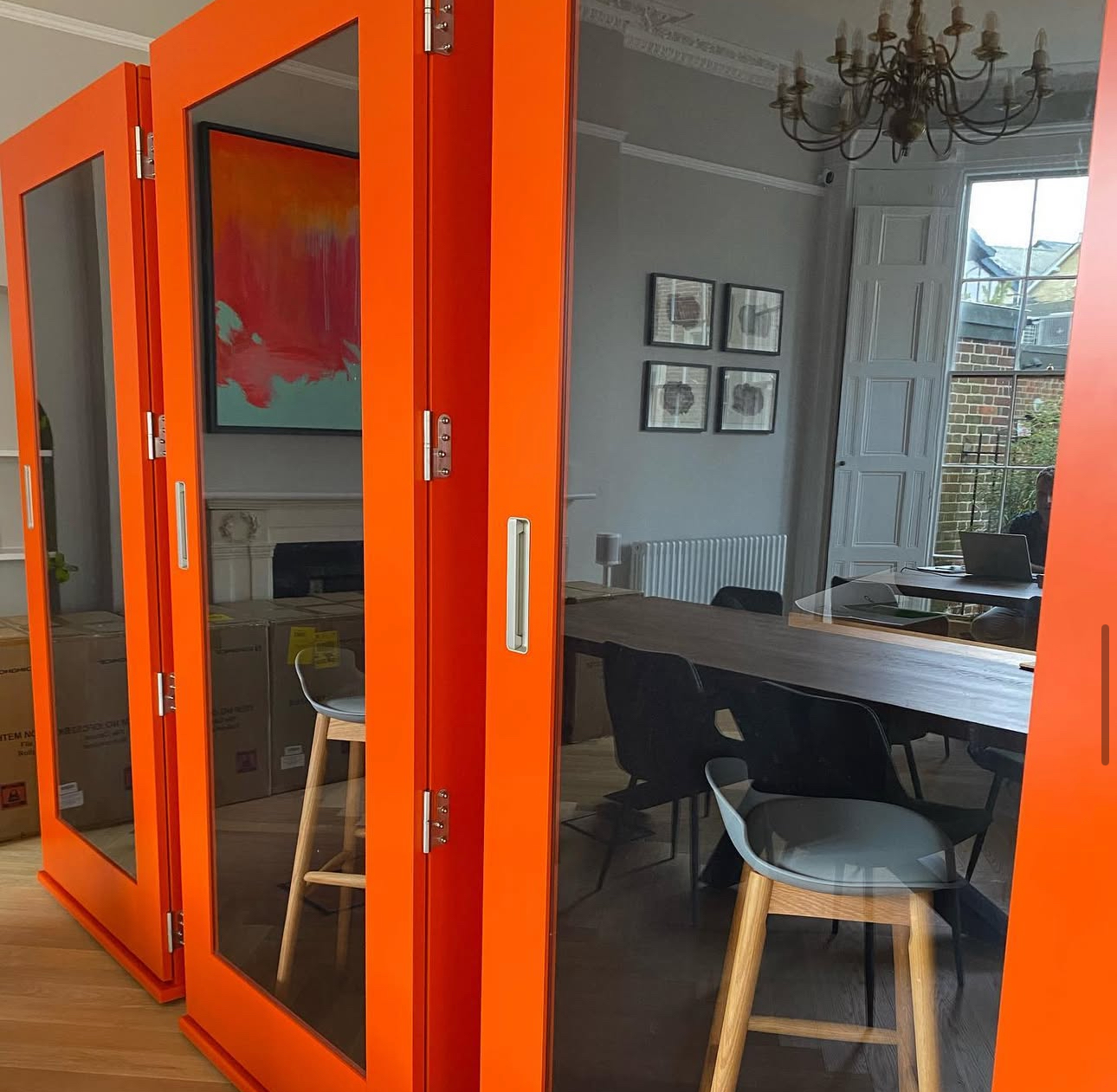Modern orange meeting pods for private calls